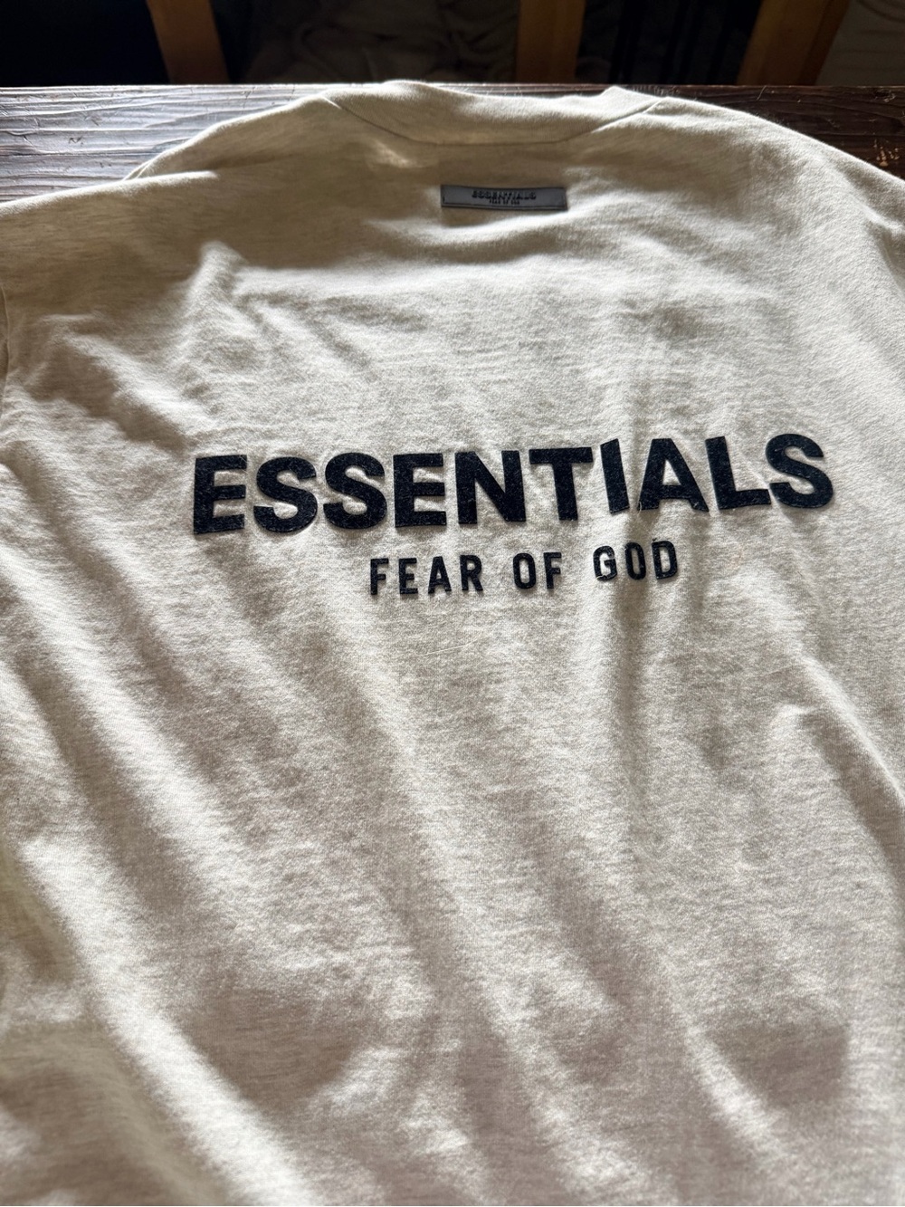 Fear of God ESSENTIALS Short Sleeve Tee - Cream with Black Logo